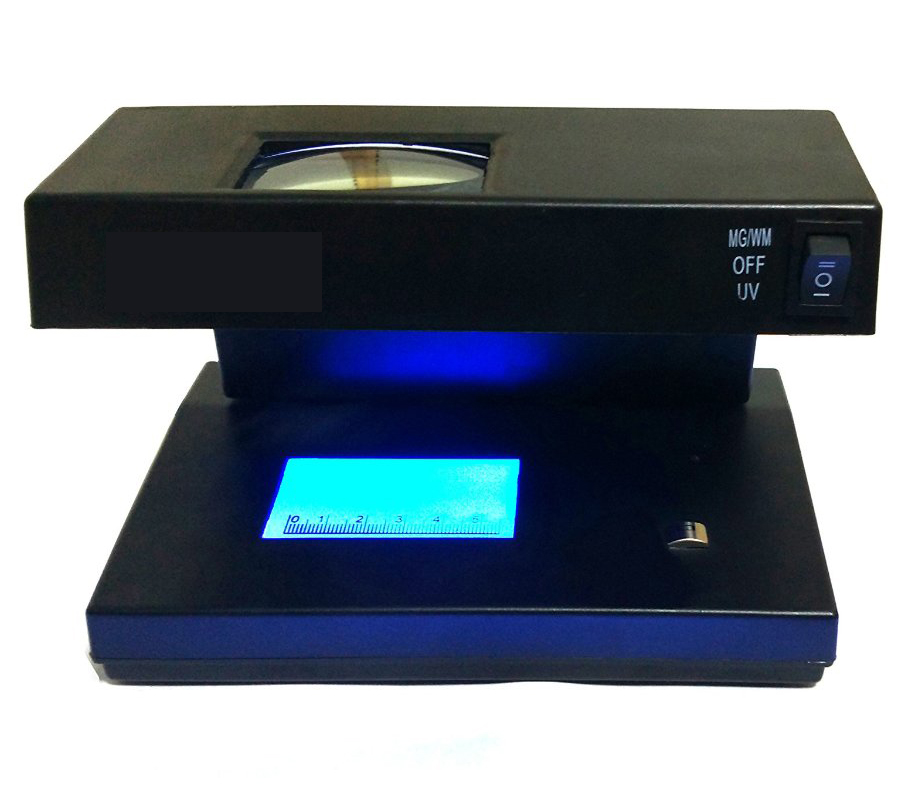 UV fake note detector with magnifier